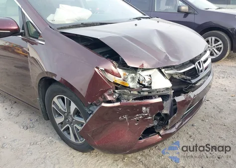 2015 Honda Odyssey Touring z USA, uszkodzony, nr VIN 5FNRL5H9XFB026405